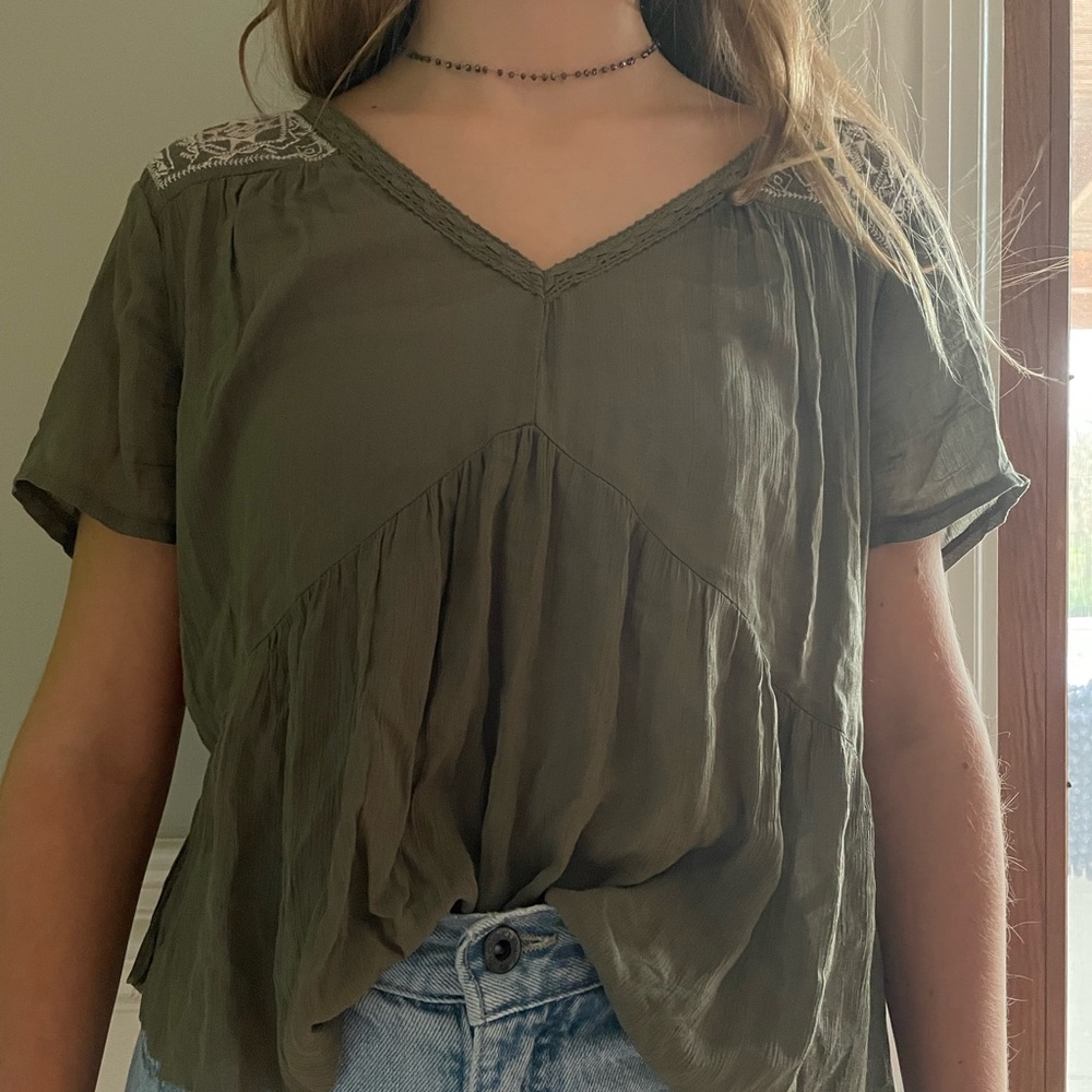 Elegant green blouse.